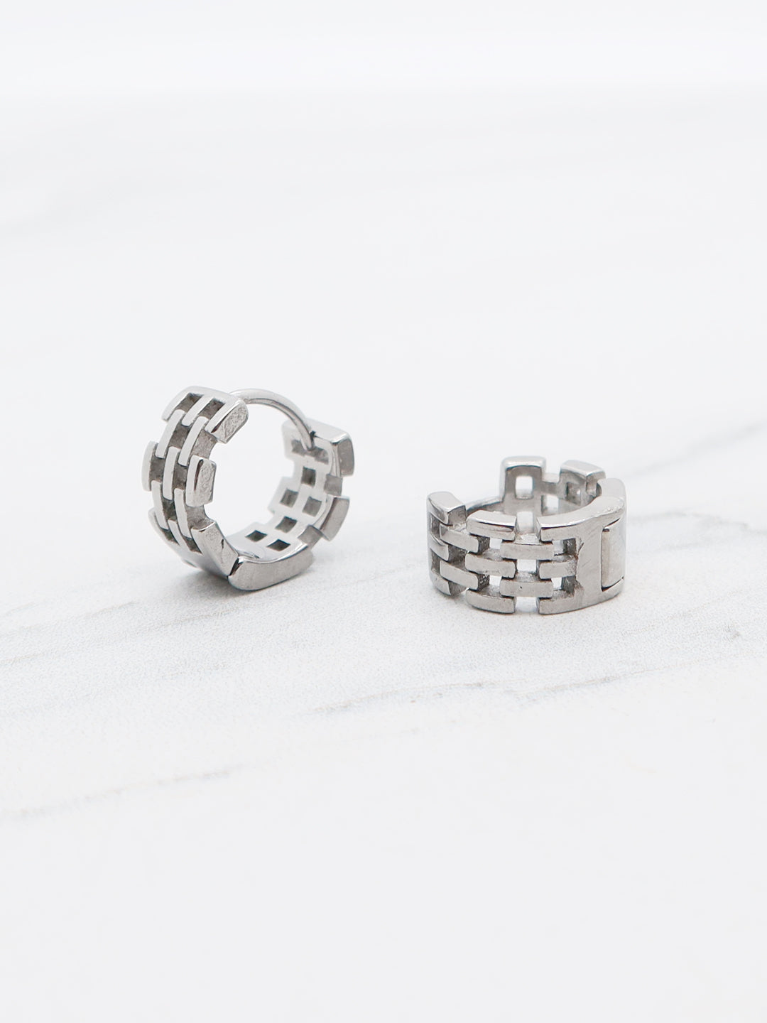 Titanium chain-link hoop earrings with an industrial, bold design, unisex punk-style huggie hoops.
