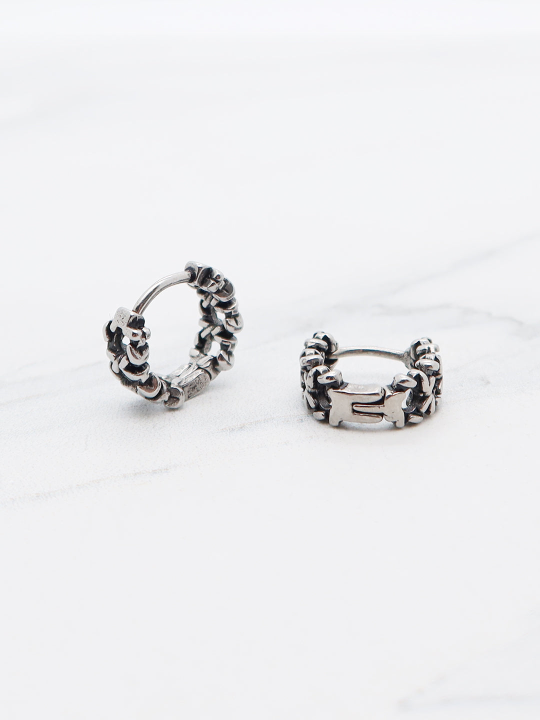 Titanium chain link hoop earrings with an oxidized silver finish, industrial style.