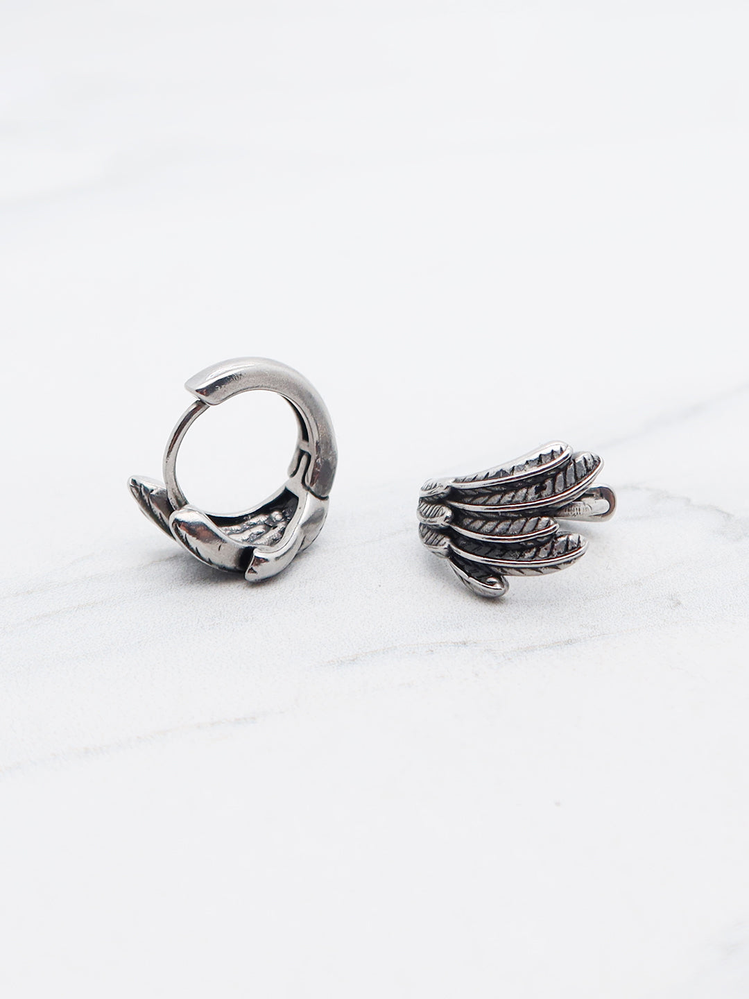 Feather wing titanium hoop earrings