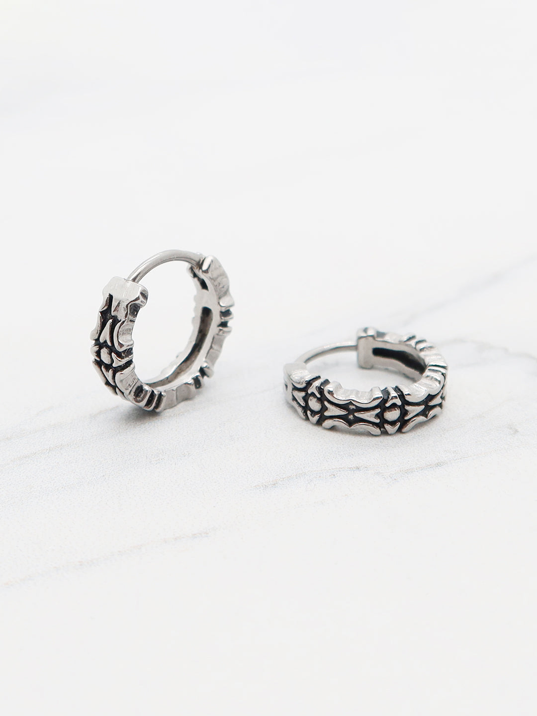 Titanium gothic cross and baroque-engraved huggie hoop earrings