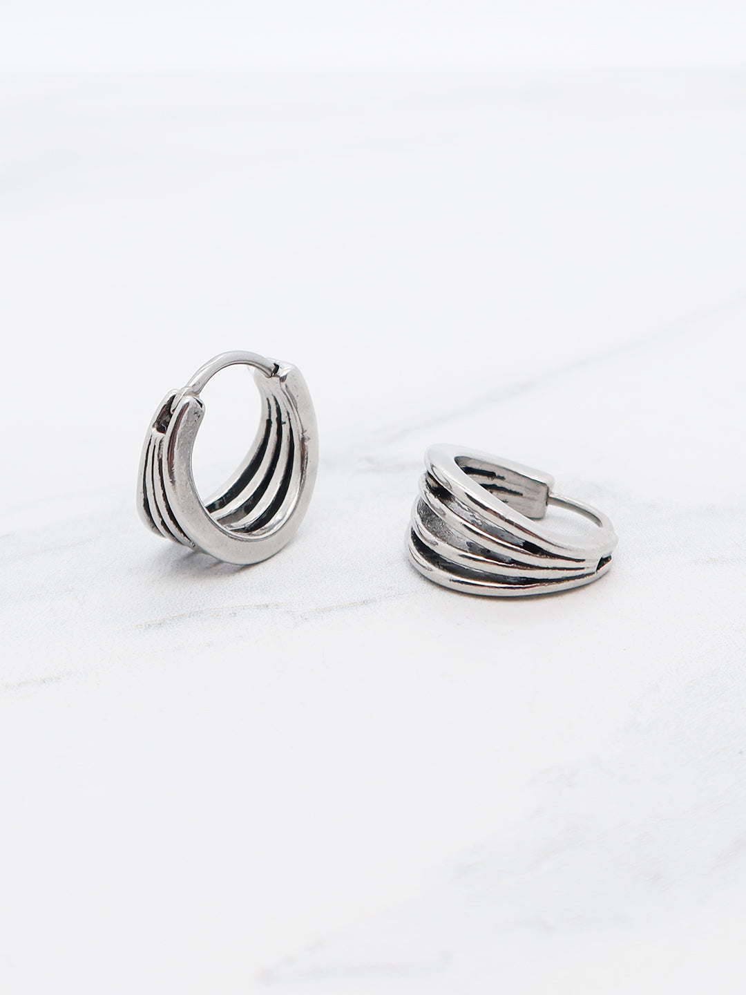 Layered ridge hoop earring with a modern, dimensional design, crafted from high-quality titanium.