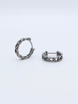 Titanium chain-link hoop earrings in huggie-style design, perfect for bold and edgy fashion.