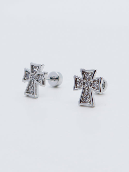 A pair of cross-shaped titanium stud earrings with crystal inlays and screw-back closure.