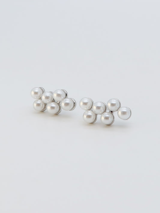 Cluster Pearl Titanium Earrings featuring a unique pearl cluster design with screw-back closure