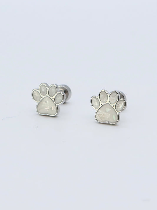 Silver-tone paw print stud earrings with white enamel inlay and flat back closure